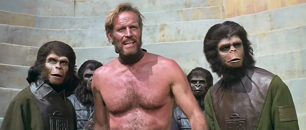 Apes with a man in Planet of the Apes.