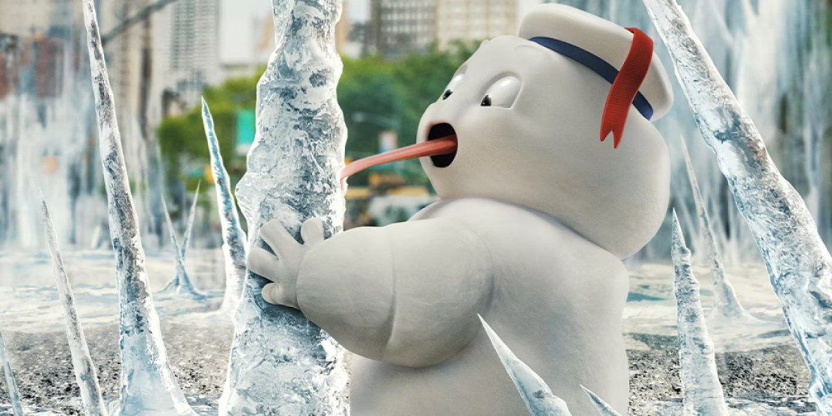 A Mini Stay Puft Marshmallow licking a piece of ice in a still from Ghostbusters: Frozen Empire.