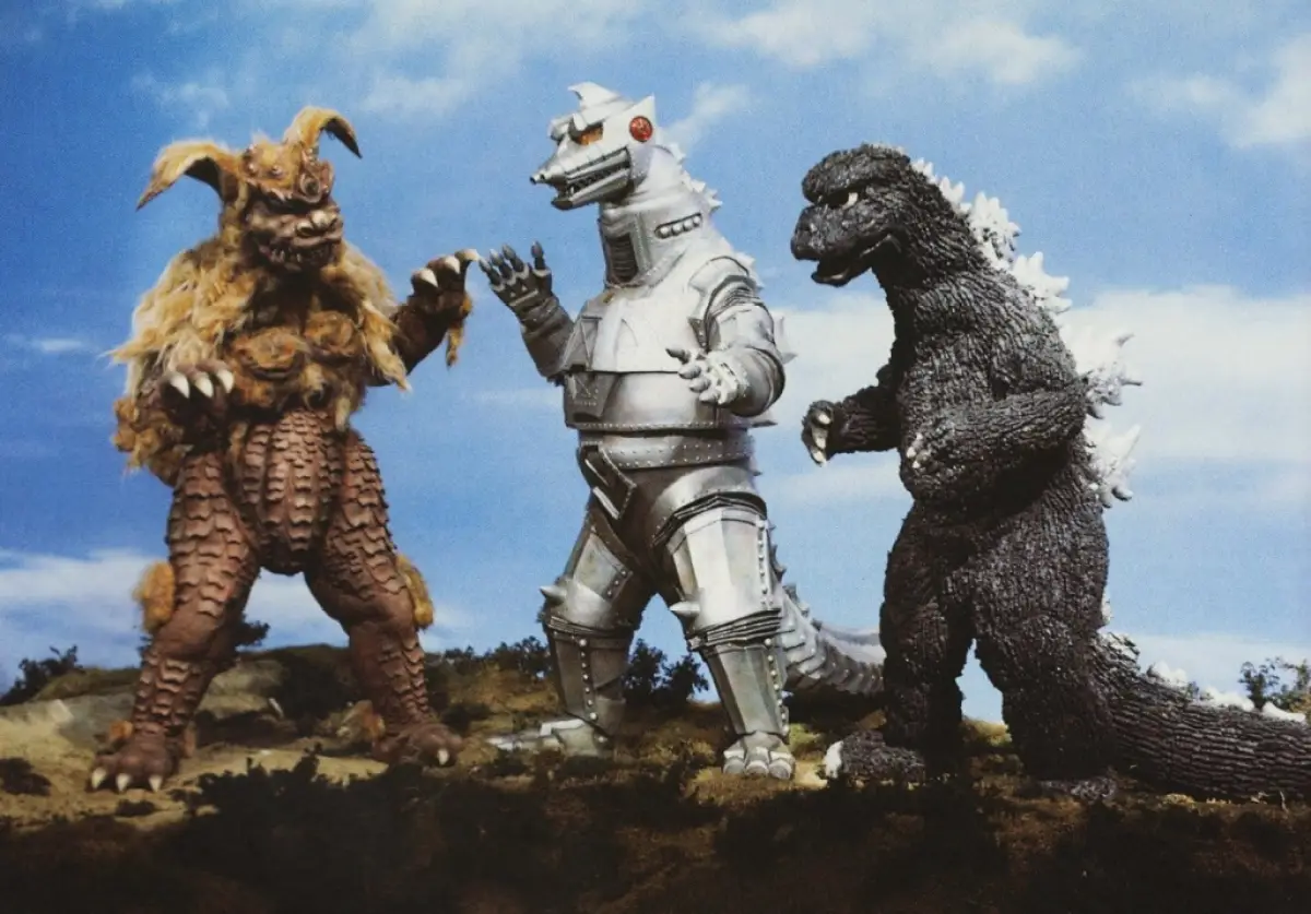El rey César y Godzilla luchan contra Mechagodzilla
