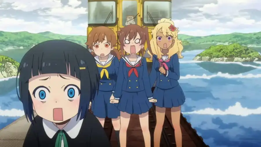 Four girls standing in front of a train in Train to the End of the World.