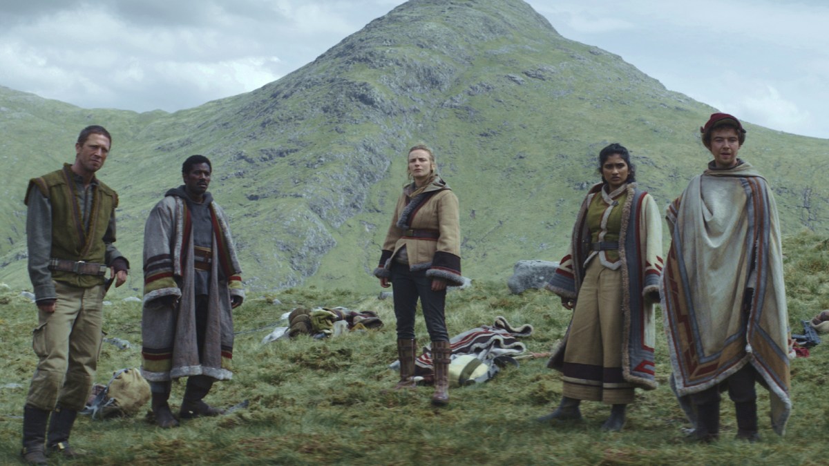 Vel Sartha's Rebels on an Aldhani mountain in a scene from Andor Season 1