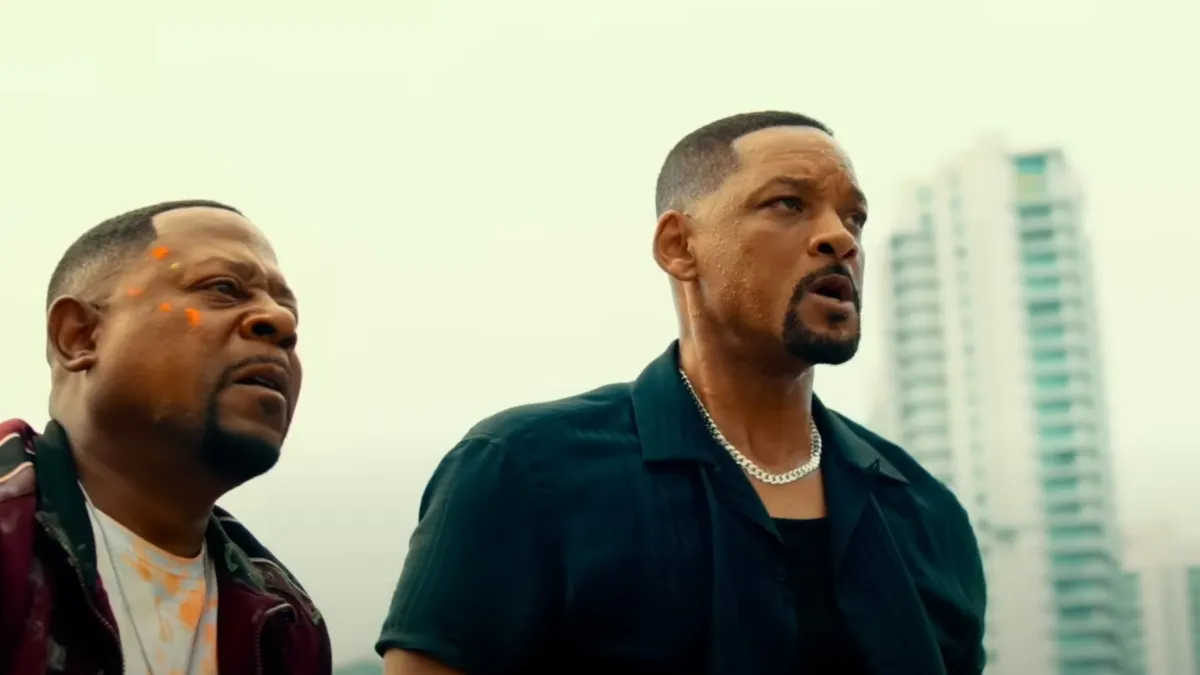 Will Smith and Martin Lawrence looking at something intently in distance