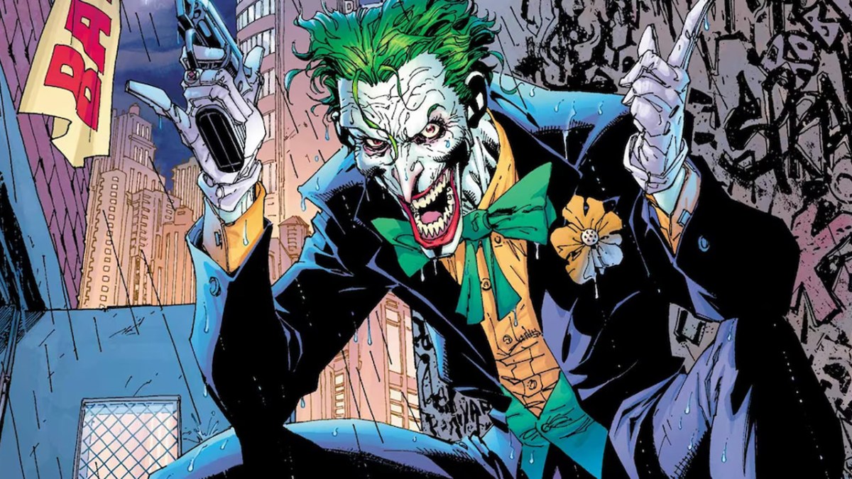 Batman villain The Joker, holding a fake gun.