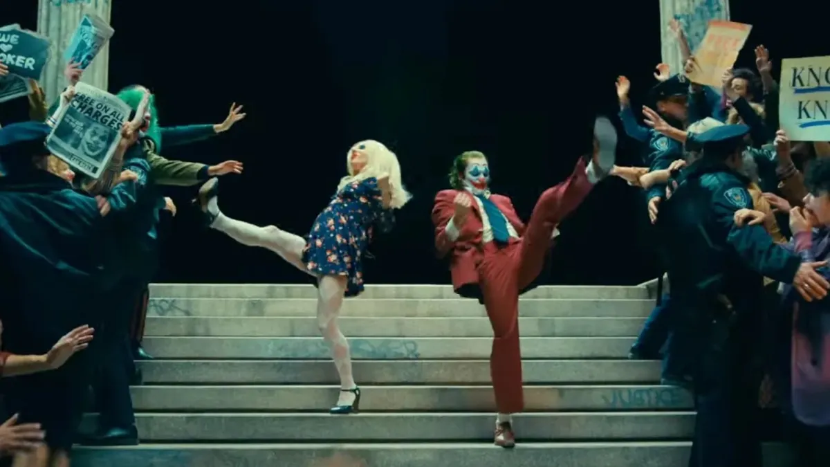 Joker and Harley Quinn Go Down The Stairs In Joker Folie A Deux