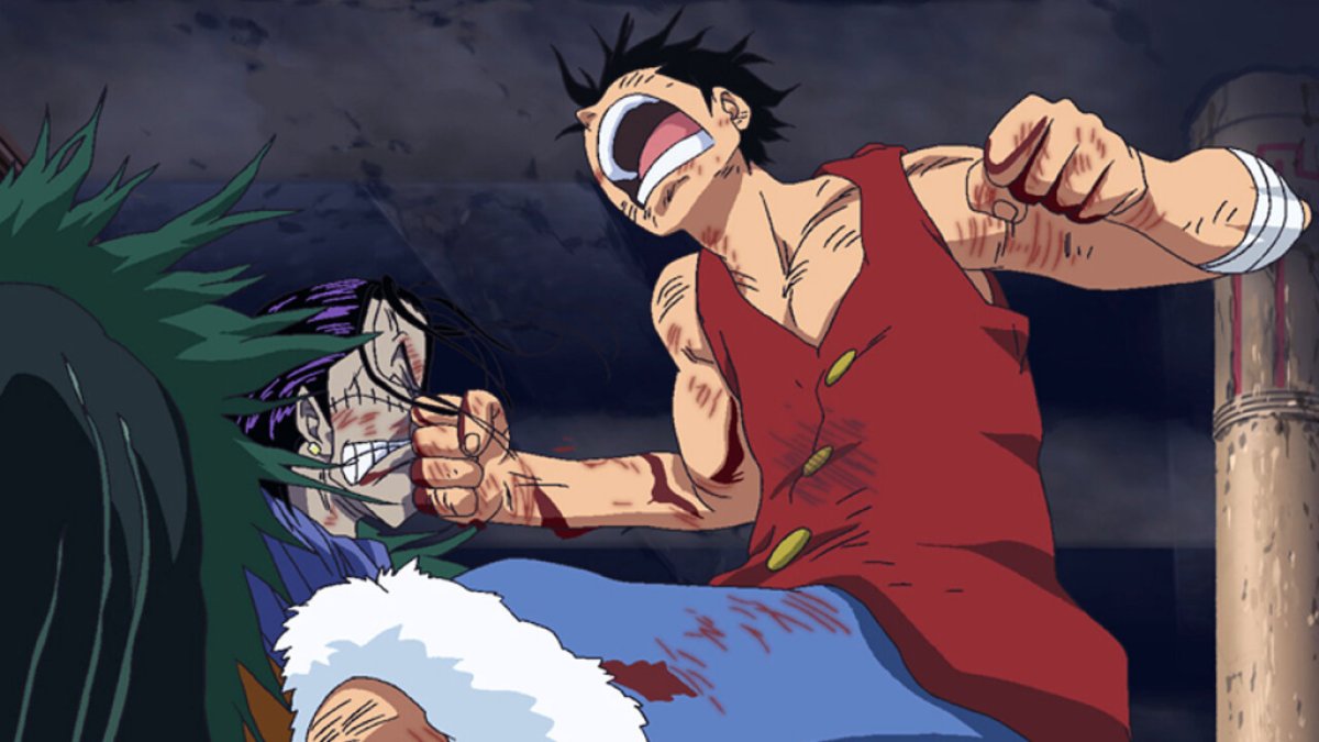 Luffy punches Sir Crocodile in the nose