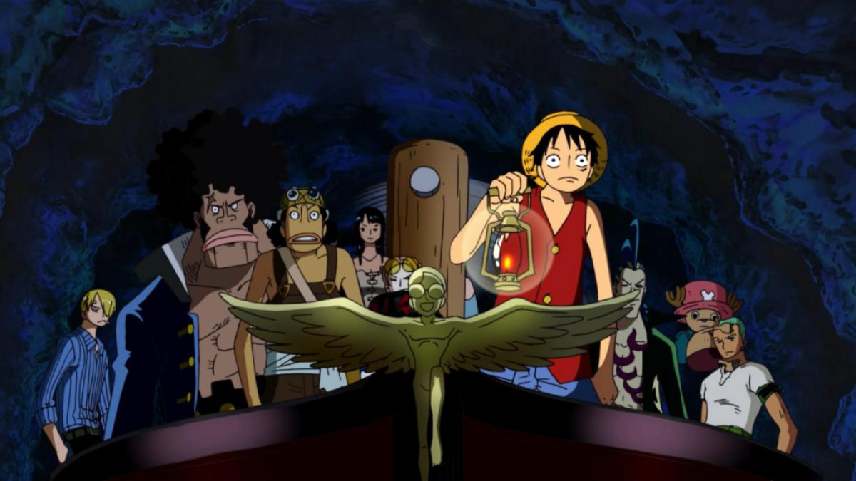 Luffy leads the Straw Hats in a cave with a lamp
