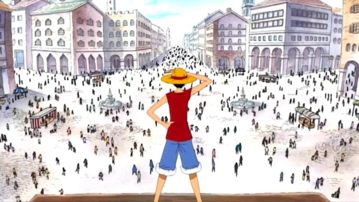 Luffy standing in Logue Town. This image is part of an article about al major one piece arcs and sagas ranked.