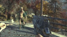 The player shooting at zombie-like Ghoul creature in Fallout 76.