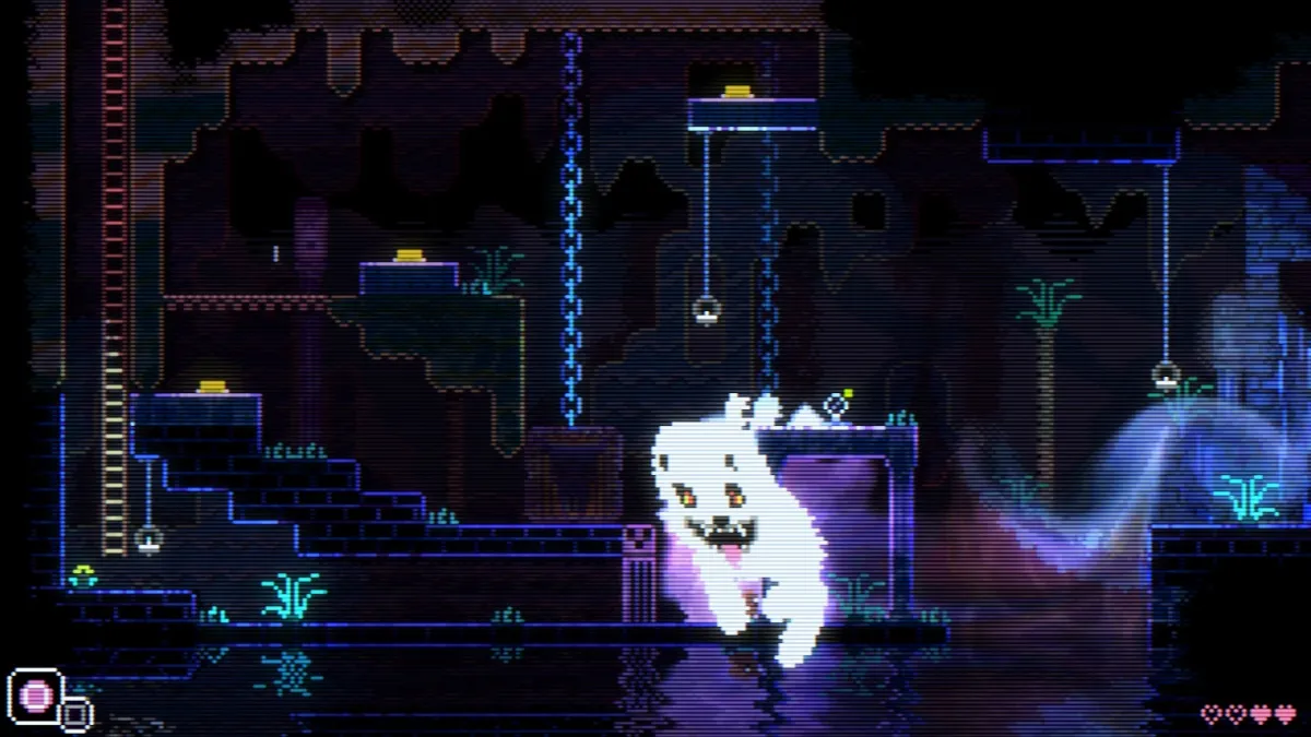 Animal Well screenshot of the ghost dog chasing the player character inside a puzzle room