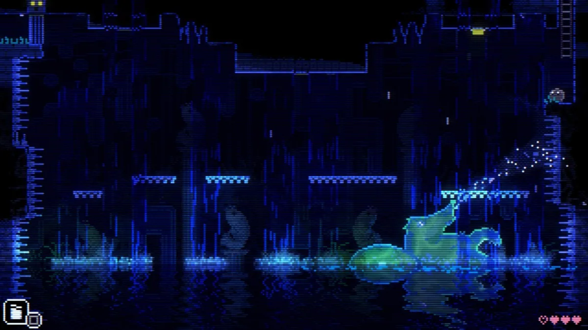 Captura de pantalla de Animal Well de un caballito de mar verde brillante escupiendo un chorro de agua