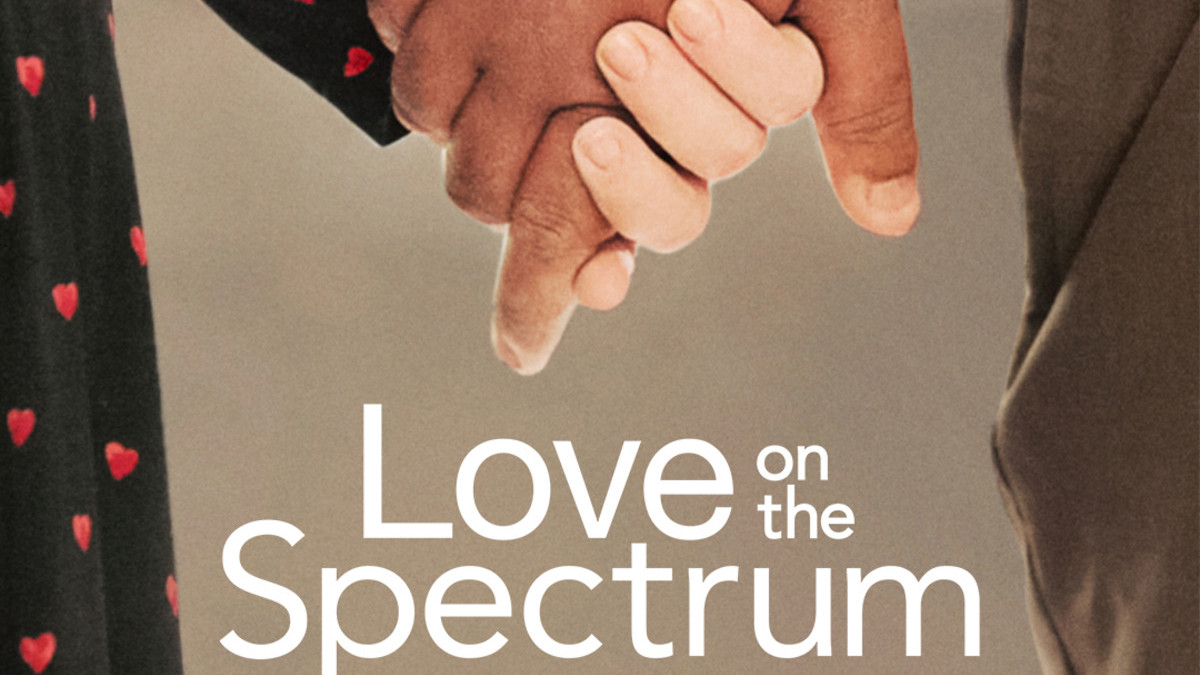 A graphics that says Love On The Spectrum, with two people holding hands
