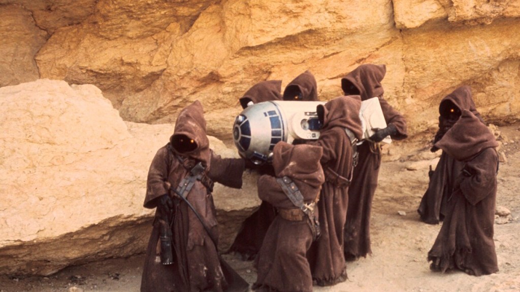 Jawas scavenging R2-D2 in Star Wars: A New Hope