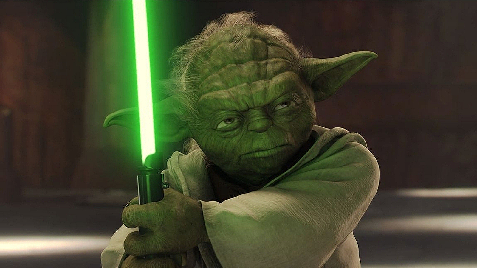 Yoda brandishing his lightsaber in Star Wars: Attack of the Clones