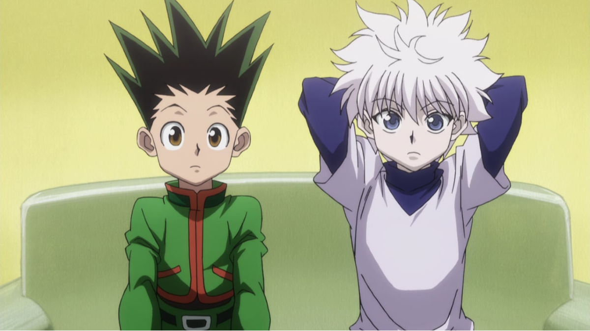 Gon sits with Killua