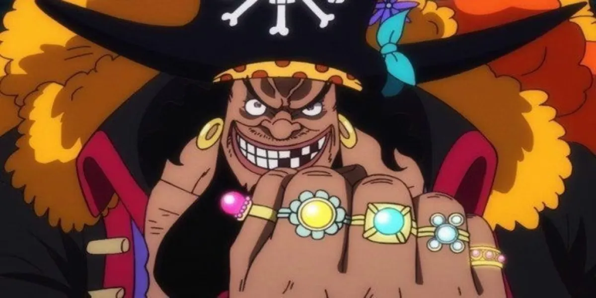 Blackbeard/Marshall D. Teach clinching his fist. This image is part of an article about the 10 strongest one piece characters, ranked.