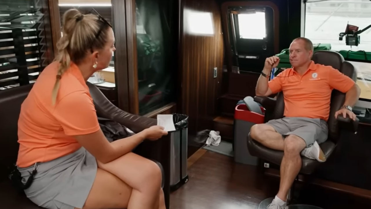 Below Deck Sailing Yacht, two cast members talking to each other in a cabin.