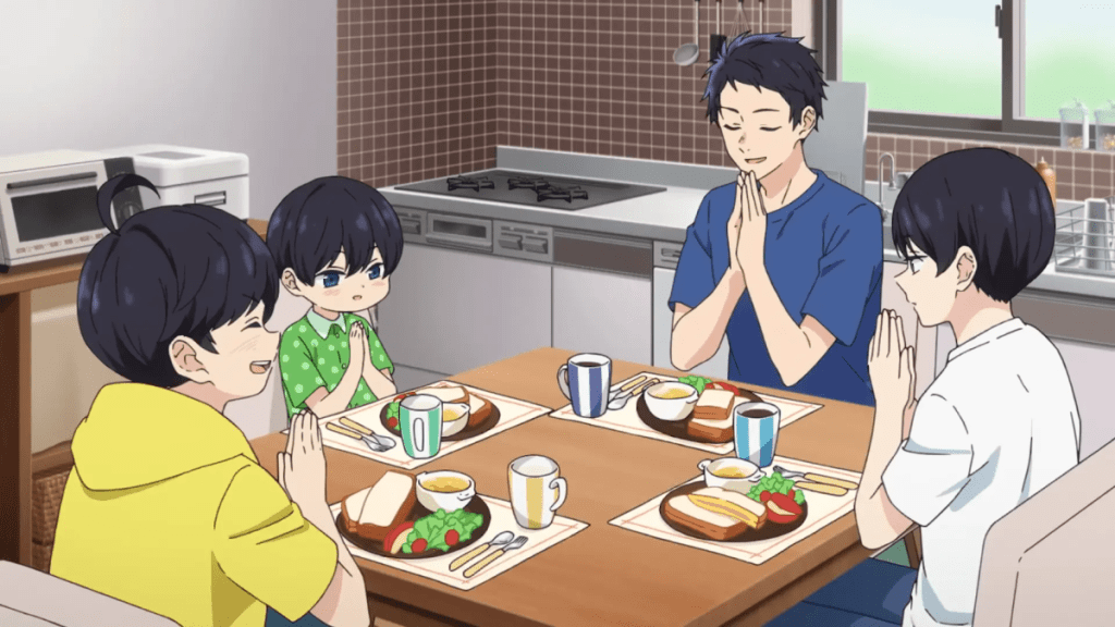 The Yuzuki brothers pray over a meal together