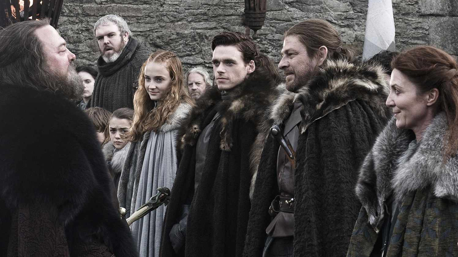 King Robert Baratheon is greeted by the Starks in Winterfell in Game of Thrones Season 1, Episode 1