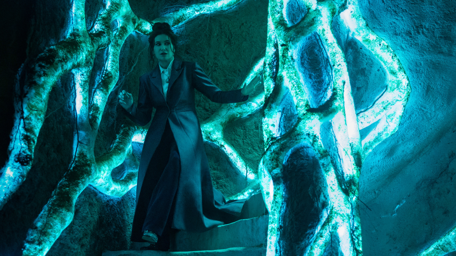 Agatha Harkness descends a glowing staircase in Agatha All Along Episode 3