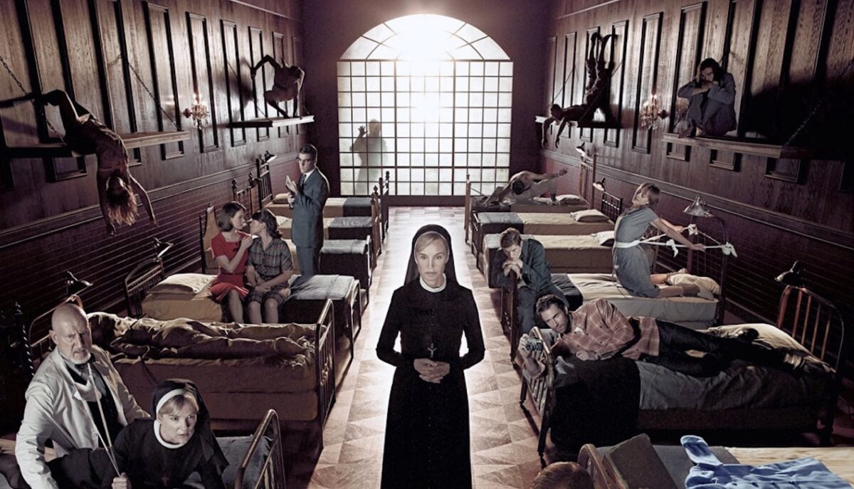 Sister Jude Martin stands in the asylum in American Horror Story.