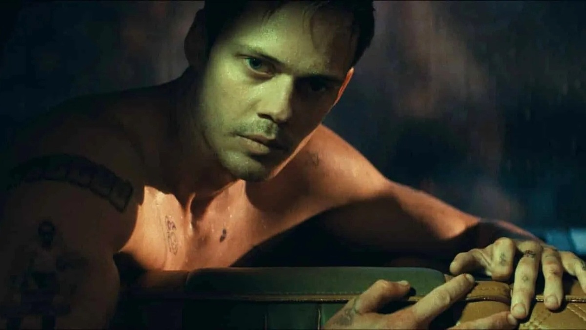 Bill Skarsgard as Eddie sweating in Locked