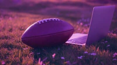 Cover photo for the best offshore sportsbooks showing a football and a laptop