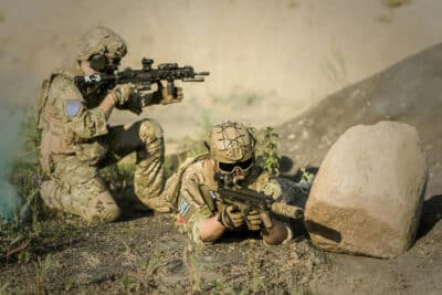 Military snipers on a hilltop