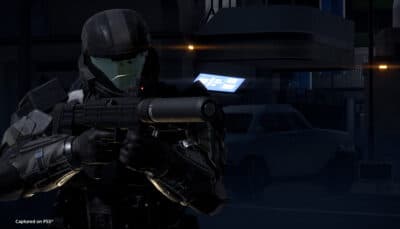 Helldiver in ODST armor aiming M6C/SOCOM silenced pistol at night.