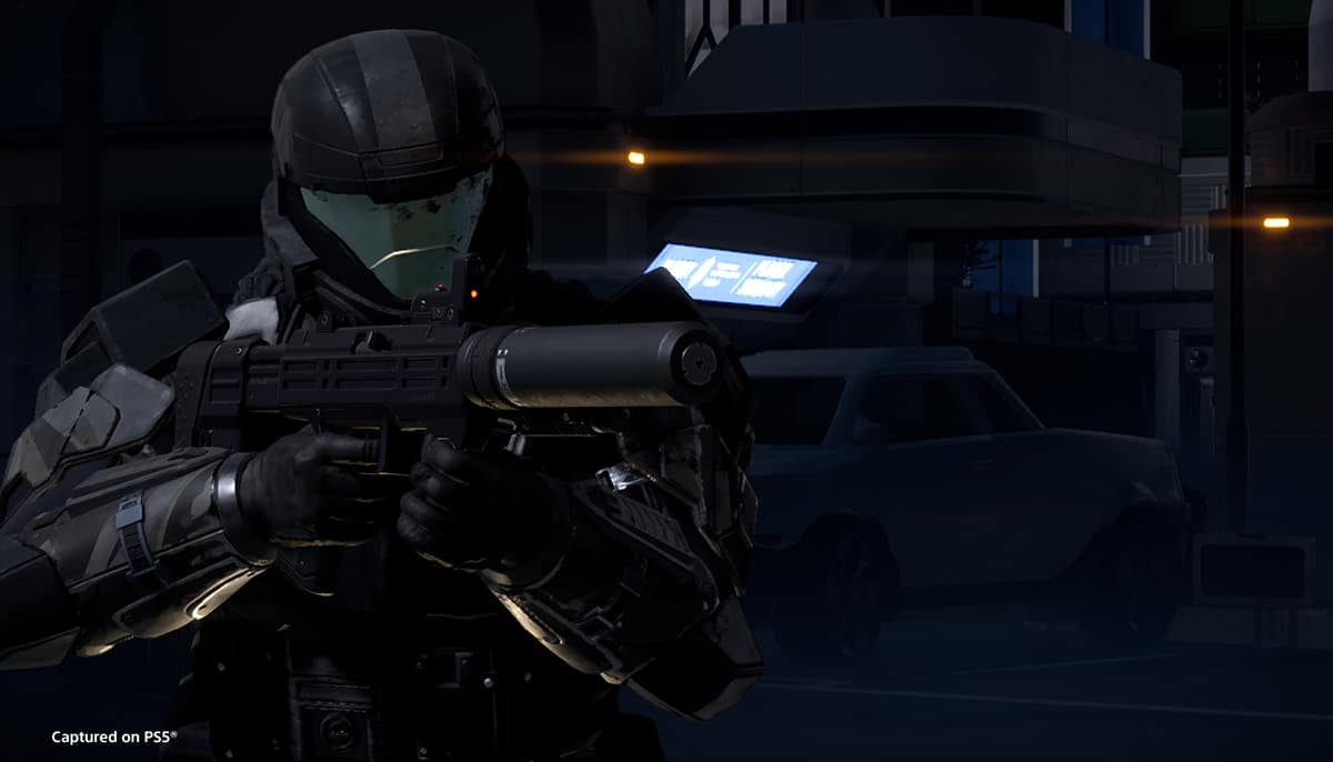 Helldiver in ODST armor aiming M6C/SOCOM silenced pistol at night.