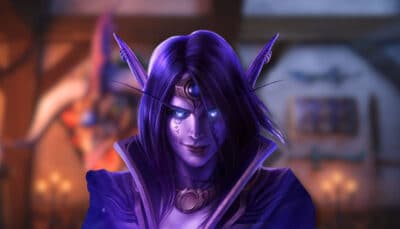 Close-up of a night elf with glowing eyes in World of Warcraft