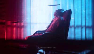 Person in headphones slouched in a chair under blue and red neon light.