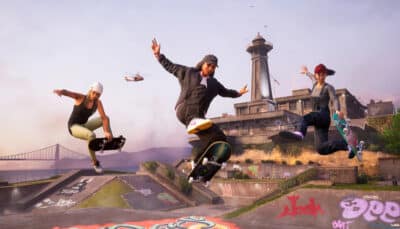 Three skaters performing tricks near a graffiti-covered skatepark