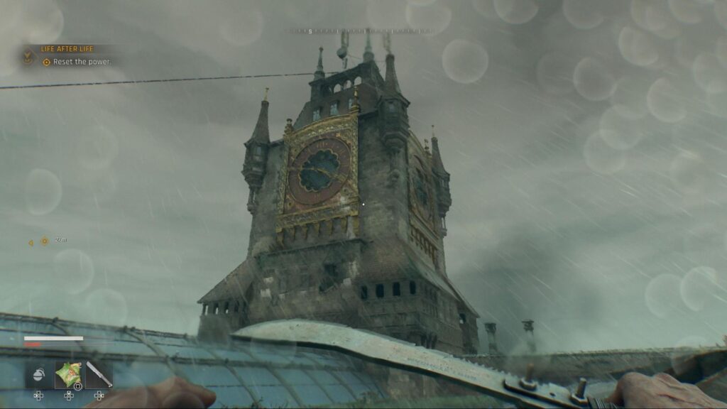 Old clock tower in rainy weather with knife in view