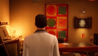 A player character stands in a warmly lit office with abstract paintings, a dartboard, and a desk, from the game Agatha Christie: Death on the Nile.