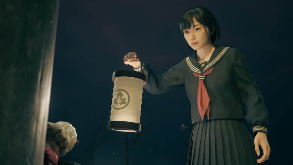 Hinako holding a paper lantern in the dark in Silent Hill f