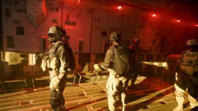 Picture of several soldiers from Battlefield 6's art style on a parachute plane ready to jump out