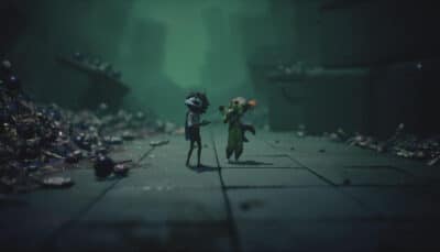 Alone and Low walk through a debris-filled corridor wearing masks in Little Nightmares 3