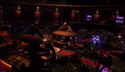 Interior of the Test Drive Unlimited Solar Crown Casino featuring tables, slot machines, and elegant decor