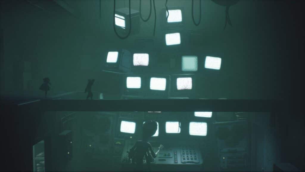 Alone and Low face a wall of flickering monitors in Little Nightmares 3