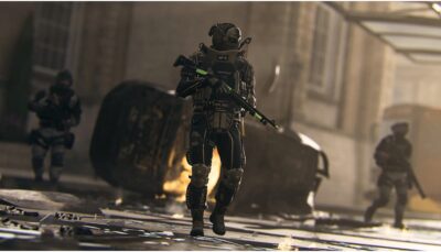 A tactical soldier advancing through a ruined street with teammates nearby, seen during an intense combat encounter in Call of Duty Black Ops 6