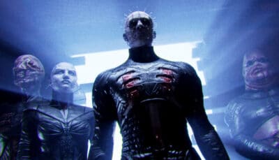 A group of cenobites steps through a blinding doorway in Clive Barker’s Hellraiser Revival. Their twisted forms emerge from the light in complete silence