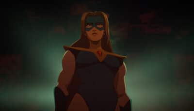Invisigal stands in the shadows wearing her new suit, symbolizing her villain turn in Dispatch