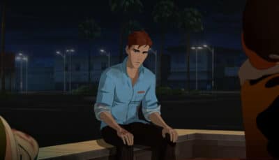 Dispatch scene at night shows a red-haired man with a bruised, serious expression sitting on a ledge