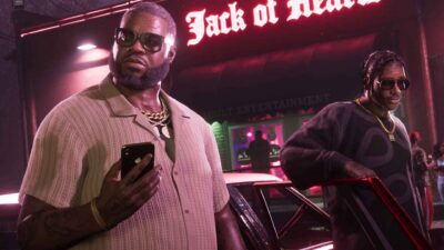 Two stylish men standing outside a neon-lit nightclub in Vice City at night, representing the criminal world of Grand Theft Auto VI.