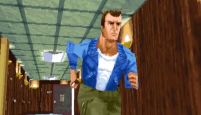 John McClane runs through a narrow office hallway during a tense moment in Die Hard