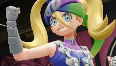 A determined trainer raises a fist with a confident smile in Pokémon Legends Z-A