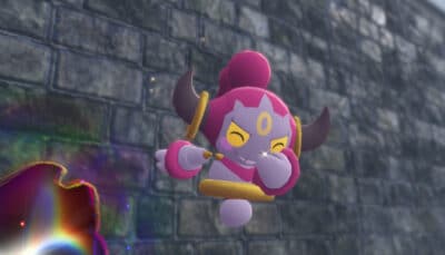 The character depicted in the photo is Hoopa, a mythical Pokémon of the dual psychic and ghost types from the Pokémon universe