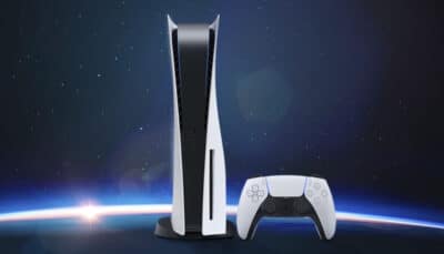 A PlayStation 5 console stands next to its controller against a space themed background