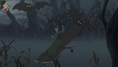 A frightened girl clings to a tree as glowing eyed bats circle her in Bye Sweet Carole