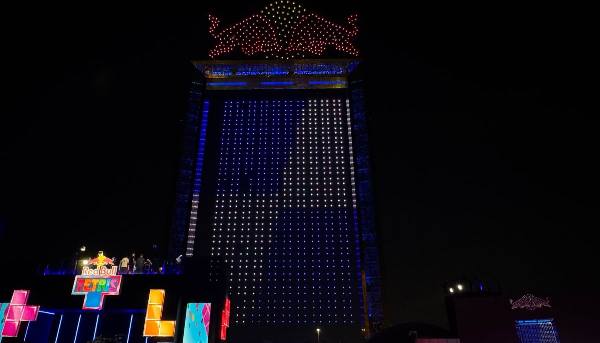 A massive LED Tetris board illuminates the night during the Tetris World Finals